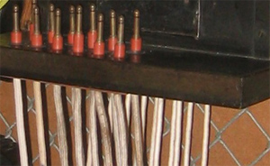 kellogg wall switchboard cords close-up